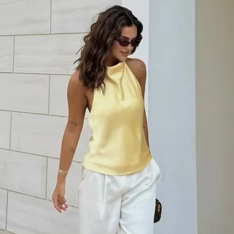 Top tipo corsé con cuello halter de satén para mujer.