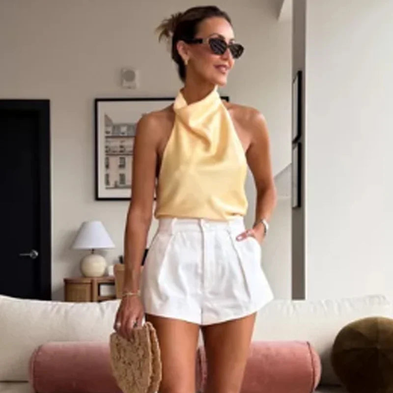 Top tipo corsé con cuello halter de satén para mujer.