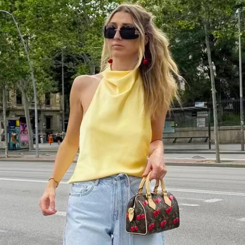 Top tipo corsé con cuello halter de satén para mujer.